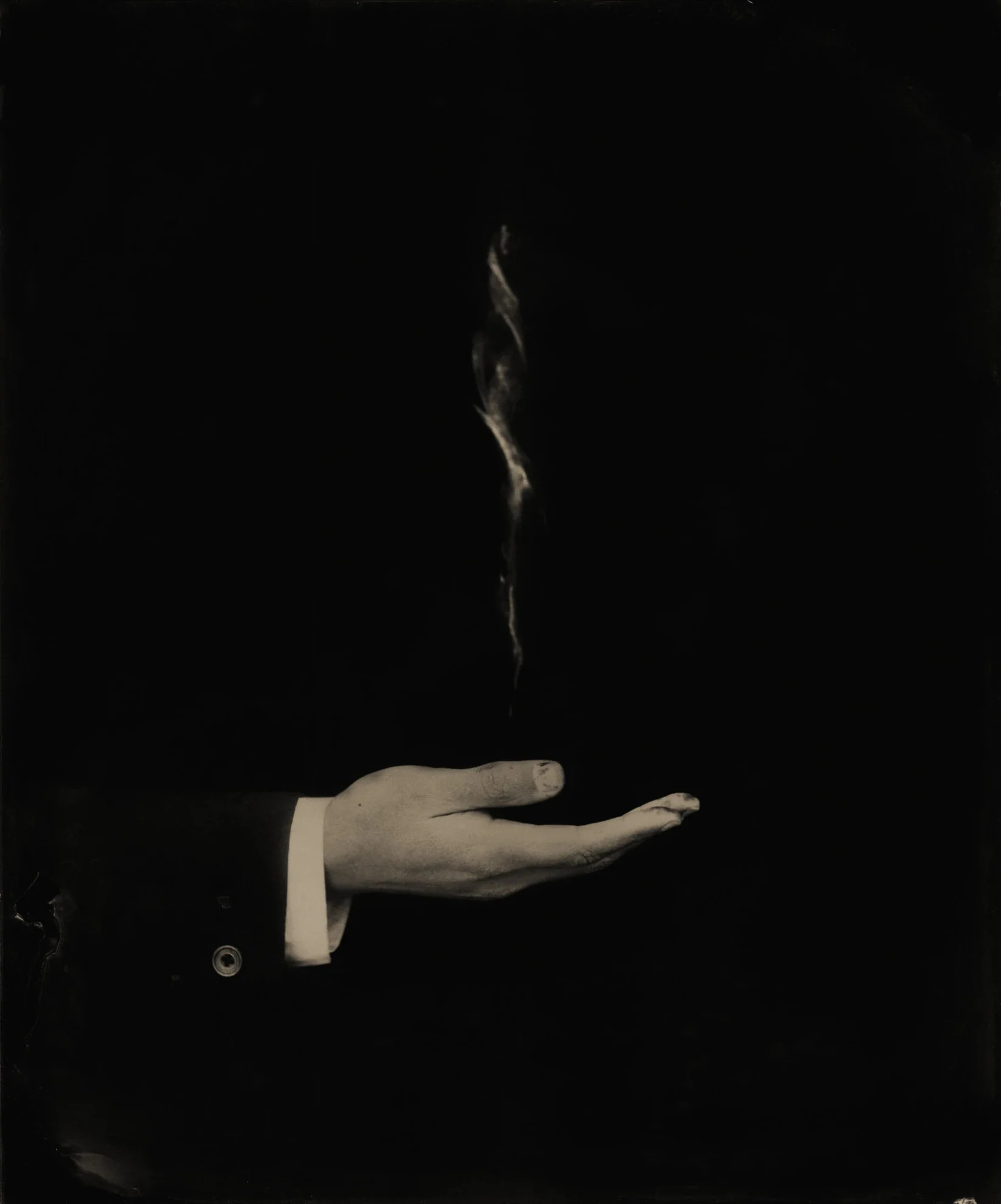 This image depicts a photograph by artist Ben Cauchi titled 'An Offer of Questionable Intent', an artwork made in 2003. The medium is ambrotype. The size of this artwork is 24x20cm. This artwork was first shown in the exhibition 'And a Great Cloud Came Down' at Christopher Moore Gallery in 2003.