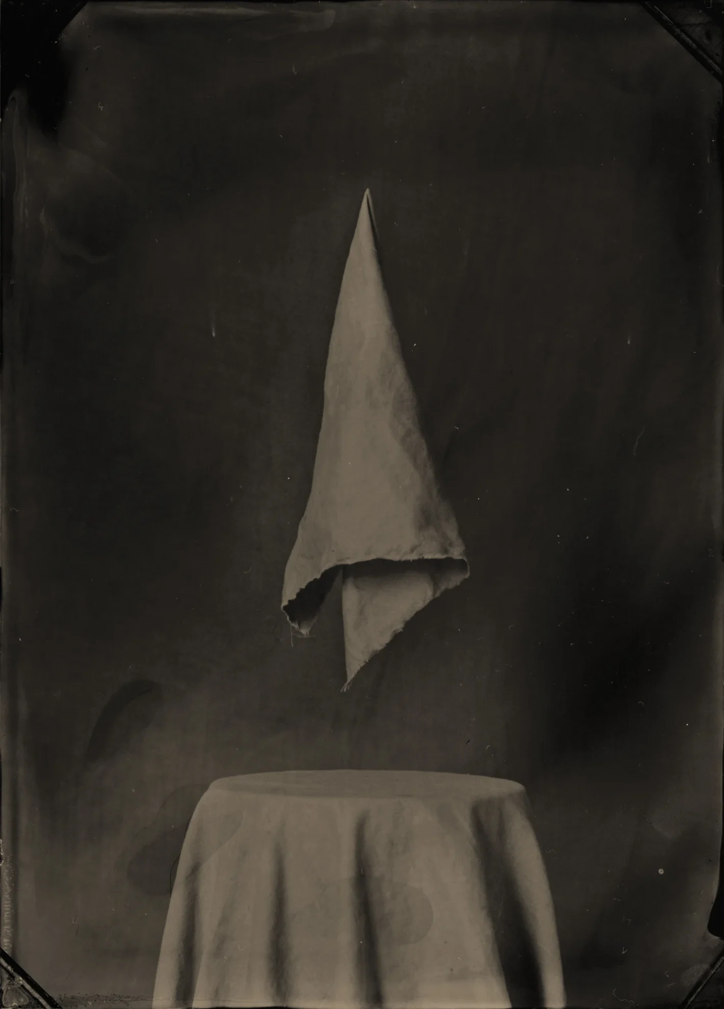 This image depicts a photograph by artist Ben Cauchi titled 'Untitled', an artwork made in 2004. The medium is tintype. The size of this artwork is 17.5x12.5 cm. This artwork was first shown in the exhibition 'Ghosting' at Christopher Moore Gallery in 2004.